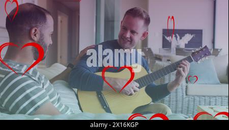 Bild von Herzsymbolen über diversen schwulen Paaren, die lächeln und Gitarre spielen Stockfoto