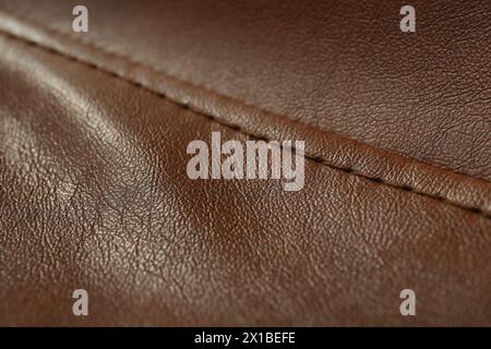 Braunes Leder mit Naht als Hintergrund, Nahaufnahme Stockfoto