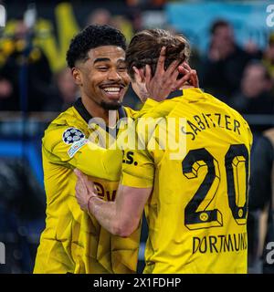 Dortmund, Nordrhein-Westfalen, Deutschland. April 2024. Borussia Dortmund Teamkollegen IAN MAATSEN (22, links) und MARCEL SABITZER (20, rechts) feiern Sabitzers Tor beim UEFA Champions League Spiel zwischen Borussia Dortmund und Atletico Madrid am 16. April 2024 im BVB Stadion Dortmund in Dortmund, Nordrhein-Westfalen. (Kreditbild: © Kai Dambach/ZUMA Press Wire) NUR REDAKTIONELLE VERWENDUNG! Nicht für kommerzielle ZWECKE! Stockfoto