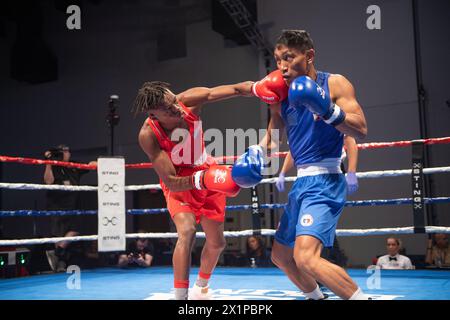 Pueblo, Colorado, USA. April 2024. Terry Washington aus den Vereinigten Staaten (Red) besiegt Rogen Ladon von den Philippinen in einem 51 kg schweren Vorkampf. Quelle: Casey B. Gibson/Alamy Live News Stockfoto