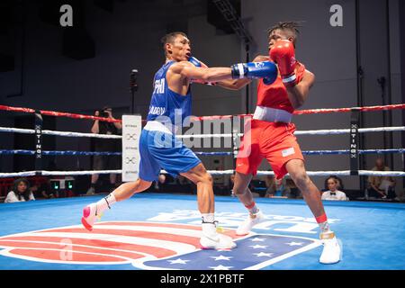 Pueblo, Colorado, USA. April 2024. Terry Washington aus den Vereinigten Staaten (Red) besiegt Rogen Ladon von den Philippinen in einem 51 kg schweren Vorkampf. Quelle: Casey B. Gibson/Alamy Live News Stockfoto