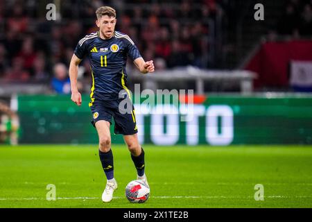 AMSTERDAM, NIEDERLANDE - 22. MÄRZ: Ryan Christie aus Schottland dribbelt mit dem Ball während des Freundschaftsspiels zwischen den Niederlanden und Schottland in Joha Stockfoto