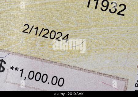 Nahaufnahme des Scheckbetrags von $1000 Stockfoto