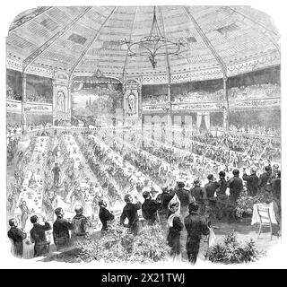 The Shakspeare Commemoration: Bankett im Pavillon von Stratford-on-Avon... The Earl of Carlisle schlägt „The Memory of Shakespeare“ vor, 1864. "...der Pavillon... war so gebaut, dass er abwechselnd den Zwecken eines Speisesaals, eines Theaters und eines Ballsaals dienen konnte. Der obere Tisch, der dem Präsidenten und den angesehensten Gästen vorbehalten war, wurde anstelle des beweglichen Orchesters vor die Bühne gestellt. Hinter dem Tisch standen die Reporter, und hinter diesen wiederum der Chor der Stratford Church, der das Geschehen mit etwas Vokalmusik belebte. Der Boden davor Stockfoto