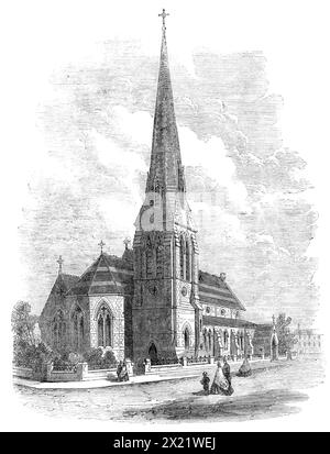 Die neue Kirche von St. Stephen, Carlisle, gebaut von Miss Burdett Coutts, 1865. „Das Äußere bietet einen angenehmen Farbkontrast durch die kluge Verwendung von rotem und weißem Stein. Der allgemeine Stil der Architektur ist geometrisch-gotisch...das auffälligste Merkmal ist der quadratische Turm am Ende der James-Straße... auf der Nordseite der Kirche, in der Hewson-Straße, befindet sich der Haupteingang der Kirche, und dies ist die Seite, auf der das Gebäude am besten zu sehen ist. Der Eingang ist durch eine Veranda mit einem geneigten Dach, der Eingang ist ein gotischer Bogen, mit einem Hundeschlitzahn-Zahn-Gestell gestützt auf eine Pilla Stockfoto