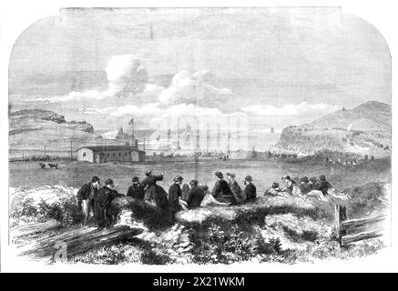 Verlegung des Atlantischen Telegrafenkabels: Beobachten, wie Caroline mit dem Ufer des Kabels auf See geht, 1865. Kupferstich nach einer Skizze von Robert Dudley. "...die Landbewohner... zeigten das größte Interesse an den Geschehnissen des Tages... an Land, wo ein Graben, 2,5 m. Tief, über den schmalen Strand und die Klippe hinauf geschnitten, um das Kabel aufzunehmen, zogen und schrien hundert oder mehr der Landbewohner in ihrer irischen Art, mit größter Begeisterung... als das Kabel unterlaufen war und wieder in die Boote gezogen wurde, und das Uferende fing wirklich an Stockfoto