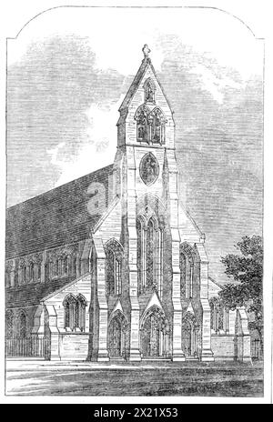 St. Clement's Church, Barnsbury, [Islington, London], 1865. "Die neue Kirche... wird fast 1000 Personen aufnehmen... der Glockenturm erhebt sich auf eine Höhe von 100 m... das östliche Ende der Kirche hat drei Lanzettenfenster... gefüllt mit Buntglas, von Clayton und Bell... die Wände der Kirche, innen und außen, sind aus Ziegeln, die Bögen und Winkel sind aus gelben malmziegeln. Äußerlich werden gelegentlich rote Ziegelsteine in die Bögen eingeführt. Badstein wird für die Verkleidung von Fenstern, Türöffnungen und anderen Teilen verwendet. Die Kirche wird durch Gasstandards aus Eisen und Messing beleuchtet, die b geliefert werden Stockfoto