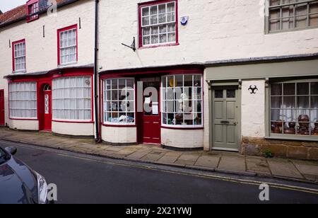 Georgianische Geschäfte mit Bugfront in der Old Bridlington High Street Stockfoto