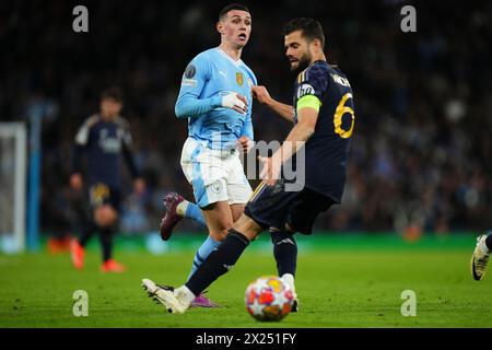 Phil Foden aus Manchester City und Nacho Fernandez aus Real Madrid spielten am 17. April 2024 im Ethiad Stadium in Manchester, England, während des UEFA Champions League-Spiels, Viertelfinals, zweites Leg, zwischen Manchester City und Real Madrid. (Foto: Bagu Blanco / PRESSINPHOTO) Stockfoto