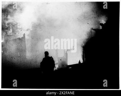 Fotos aus dem offiziellen Kriegsbüro-Film von Captain Tennyson D’Eyncourt dokumentieren die Reaktion der Londoner Blitz und der britischen Armee während der Luftangriffe. Stockfoto