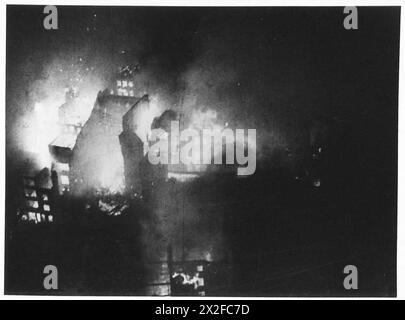 Fotos aus dem offiziellen Kriegsbüro-Film von Captain Tennyson D’Eyncourt dokumentieren die Aktivitäten der britischen Armee und die Auswirkungen der Bombardements während des Londoner Blitzes. Stockfoto