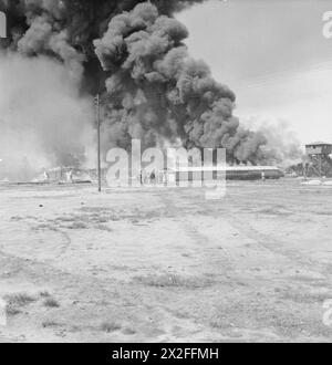 Im Mai 1945 evakuierten britische Truppen überlebende Häftlinge von Bergen-Belsen, beerdigten die Verstorbenen und zerstörten das Lager mit Flammenwerfer, um eine Ausbreitung der Krankheit zu verhindern. Stockfoto