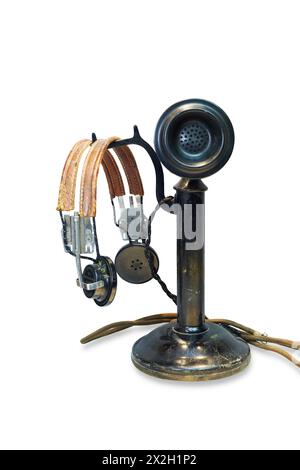Vintage-Tischtelefon mit Kerzenhalter Stockfoto