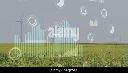 Bild der Datenverarbeitung und Diagramme über Windturbinen auf dem Feld Stockfoto