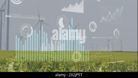 Bild der Datenverarbeitung und Diagramme über Windturbinen auf dem Feld Stockfoto