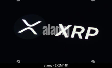 Rottweil, Deutschland. April 2024. Das Logo der Kryptowährung Ripple (XRP) ist auf der Handelsplattform CoinMarcetCap zu sehen. Quelle: Silas Stein/dpa/Alamy Live News Stockfoto