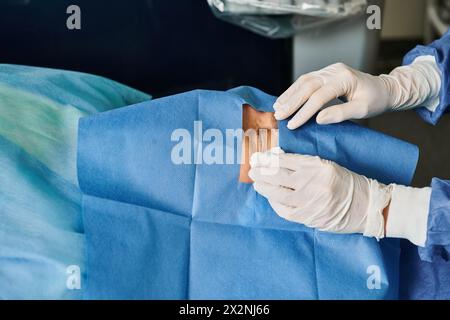 Person im Krankenhauskleid führt Operationen durch. Stockfoto