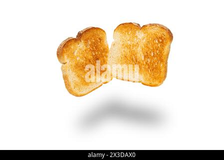 Scheiben Weißbrot, geröstet auf einer schwarzen Schale. Stockfoto
