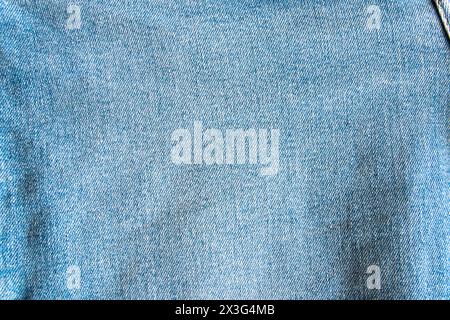 Blaue Jeans, Baumwollkleidung mit sanfter Textur. Textilinhalt. Denim. Stockfoto