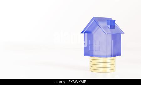 Ein elektrisches blaues rechteckiges Haus liegt auf einem Stapel Goldmünzen Stockfoto