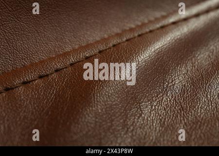 Braunes Leder mit Naht als Hintergrund, Nahaufnahme Stockfoto