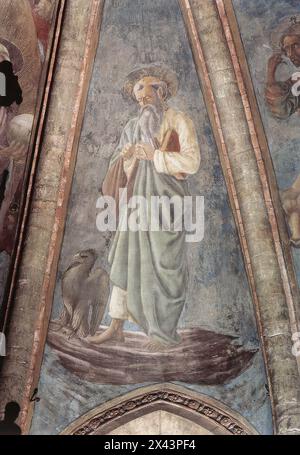 ANDREA DEL CASTAGNO (* 1423, Castagno, d. 1457, Florenz) St. Johannes der Evangelist 1442 Fresko San Zaccaria, Venedig 1442 ging Andrea nach Venedig, wo er zusammen mit einem Künstler namens Francesco da Faenza die Decke der Kapelle des heiligen Tarasius in der Kirche San Zaccaria mit Fresken malte (wahrscheinlich Francesco Torelli). Dies ist das erste signierte und datierte Werk des Malers, obwohl er bereits früher, vermutlich 1440–41, eine Kreuzigung mit Heiligen für das Kloster Santa Maria degli Angeli gemalt hatte, heute im Krankenhaus Santa Maria Nuova. Sowohl dieses Gemälde als auch die Fresken von San Zaccaria d Stockfoto