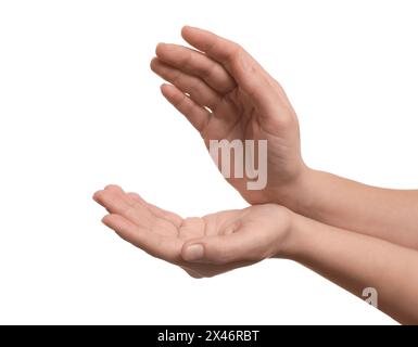 Frau hält etwas in den Händen auf weißem Hintergrund, Nahaufnahme Stockfoto