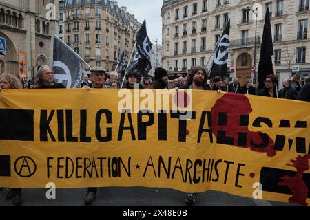 Paris, Frankreich. Mai 2024. Mehrere Gruppen treffen sich zu einem libertären Marsch vor den Hauptdemonstrationen in Paris. (Foto: Joao Daniel Pereira/SIPA USA) Credit: SIPA USA/Alamy Live News Stockfoto