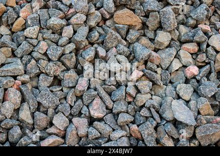 Hintergrund der Kiesstruktur. Kleine Steine für Landschaftsgestaltung und Bauarbeiten Stockfoto