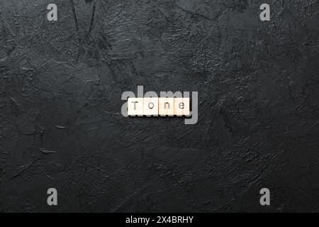 Ton Wort geschrieben auf Holzblock. Ton Text auf Zement-Tisch für Ihr Design, Konzept. Stockfoto
