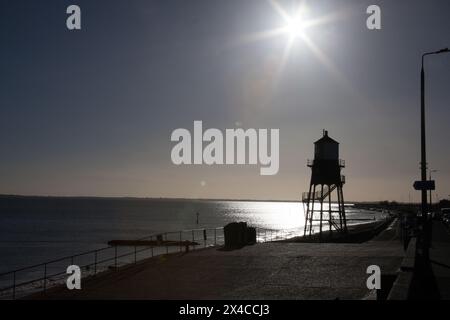 Ein viktorianischer Leuchtturm am Strand von Dovercourt, Harwich, Essex in Großbritannien Stockfoto