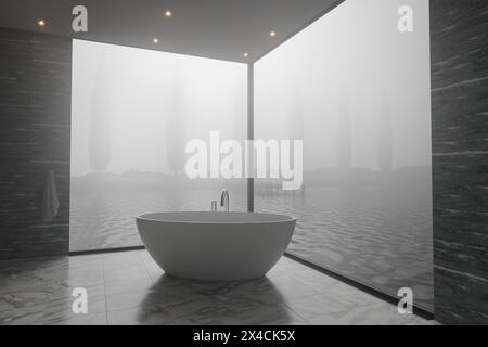 Elegantes Badezimmer mit freistehender Badewanne vor Einem wunderschönen See im Morgennebel Stockfoto