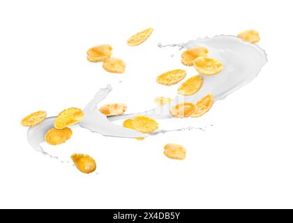 Leckere Cornflakes und Milchspritzer isoliert auf weiß Stockfoto