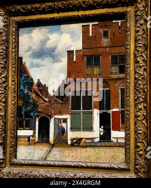 Blick auf die Häuser in Delft, bekannt als „kleine Straße“, Johannes Vermeer, Rijksmuseum, Amsterdam, Niederlande. Stockfoto