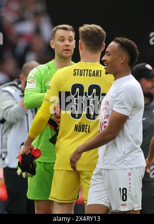 STUTTGART – 04. MAI: Manuel neuer von Bayern München mit Alexander Nuebel vom VFB Stuttgart nach dem Bundesliga-Spiel zwischen VfB Stuttgart und FC Bayern München in der MHPArena am 04. Mai 2024 in Stuttgart. © diebilderwelt / Alamy Stock Stockfoto