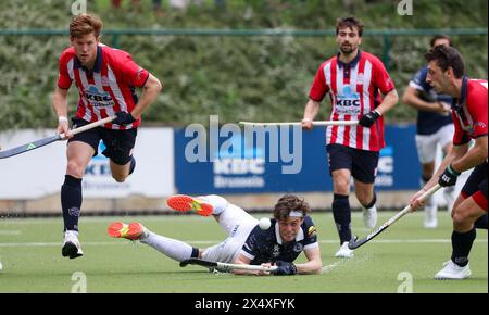 Brüssel, Belgien Mai 2024. Guillaume Hellin von Gantoise kämpft um den Ball während eines Hockeyspiels zwischen Royal Leopold Club und Gantoise am Sonntag, den 5. Mai 2024, in Brüssel, einem Rückspiel im Halbfinale der Play-offs der belgischen Hockeymeisterschaft. BELGA PHOTO VIRGINIE LEFOUR Credit: Belga News Agency/Alamy Live News Stockfoto