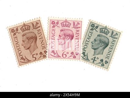 Eine Montage von Briefmarken von König George VI. Aus Großbritannien auf weißem Hintergrund. Stockfoto