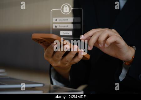 Frau meldet sich mit dem Smartphone an und gibt Benutzernamen und Passwort für den sicheren Internetzugang ein Stockfoto