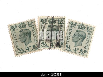 Eine Montage der Briefmarken von König Georg VI. 4. Aus Großbritannien auf weißem Hintergrund. Stockfoto