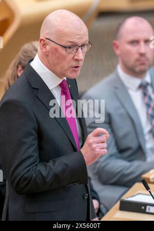 John Swinney spricht vor der Kammer, nachdem er als erster Minister im schottischen Parlament in Edinburgh gewählt wurde. Bilddatum: Dienstag, 7. Mai 2024. Stockfoto