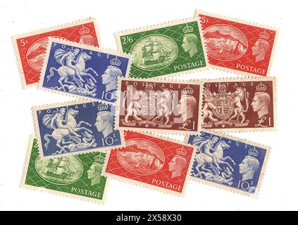Eine Montage von hochwertigen Münzpostmarken von King George VI aus Großbritannien auf weißem Hintergrund. Stockfoto