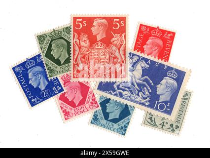 Eine Montage von Briefmarken von König George VI. Aus Großbritannien auf weißem Hintergrund. Stockfoto