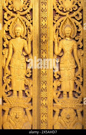 Verzierte Tür im Wat Sensoukharam, Luang Prabang, Laos Stockfoto