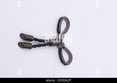 Zubehör für Schuhe, Gürtel und Taschen isoliert auf weißem Hintergrund Stockfoto