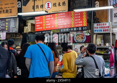 Lokaler Rübenkuchenhändler in Taichung, zweiter öffentlicher Markt. Der alte Markt war schon immer der Favorit von Rucksackreisenden, Stockfoto