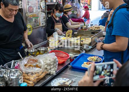 Lokaler Rübenkuchenhändler in Taichung, zweiter öffentlicher Markt. Der alte Markt war schon immer der Favorit von Rucksackreisenden, Stockfoto