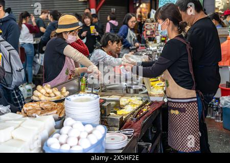 Lokaler Rübenkuchenhändler in Taichung, zweiter öffentlicher Markt. Der alte Markt war schon immer der Favorit von Rucksackreisenden, Stockfoto