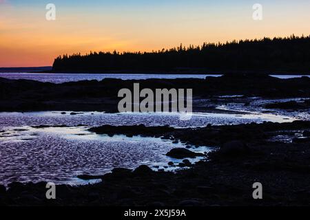 Silhouette des Southwest Harbor bei Sonnenuntergang Stockfoto