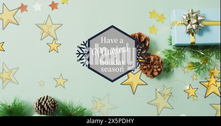 Bild: Habe eine magische Weihnachtszeit Text und Sterne über Geschenken und Dekorationen Stockfoto