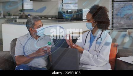 Birassischer Seniorengroßvater und Tochter mittleren Alters diskutieren über Medikamente Stockfoto